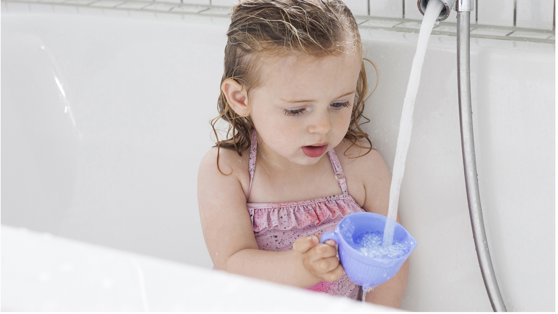 Little girl in bath tub with cup, running water, Water segment